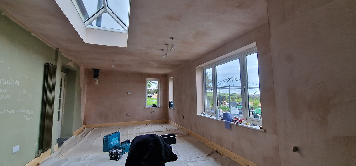 plastered room prepped for paint