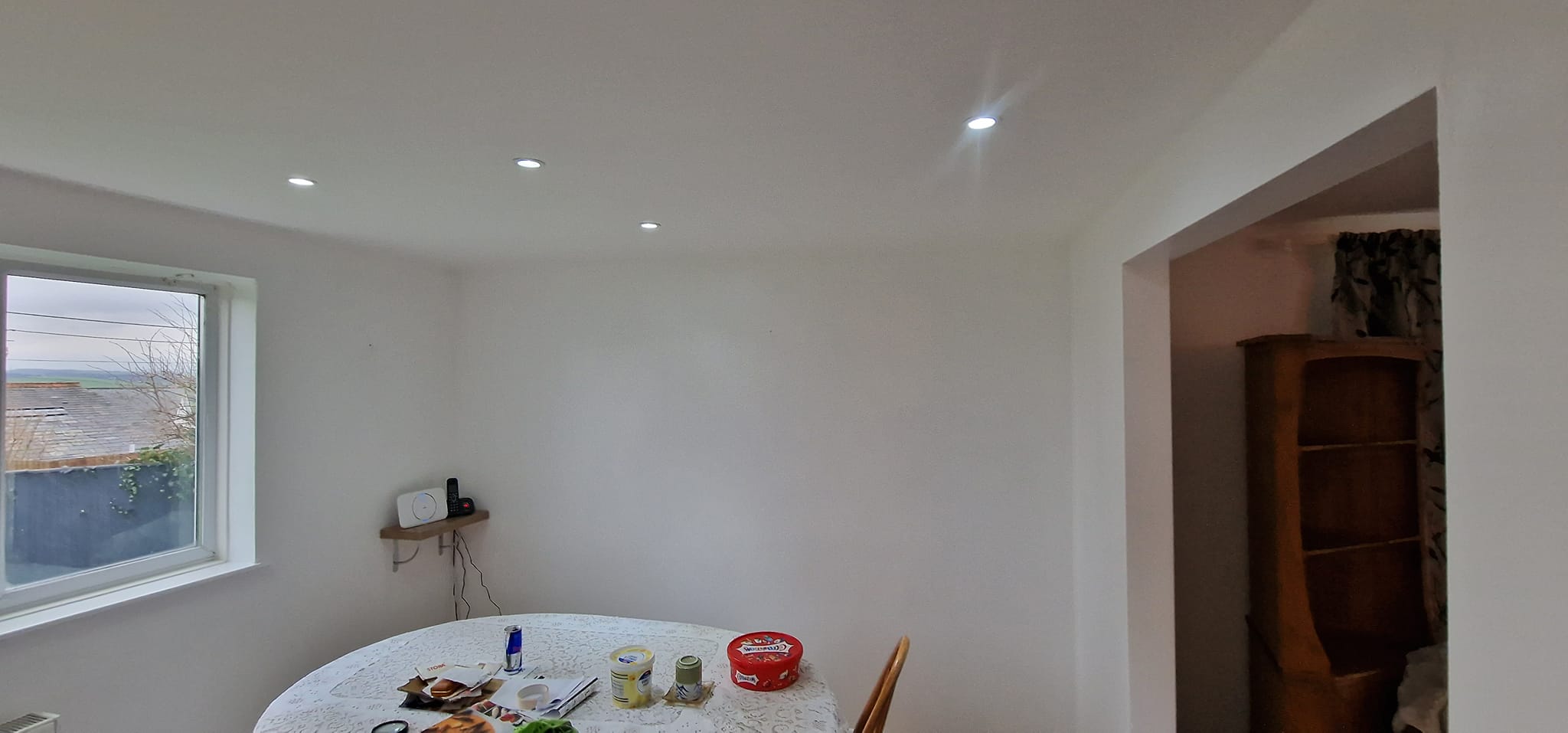 white room with white spotlights