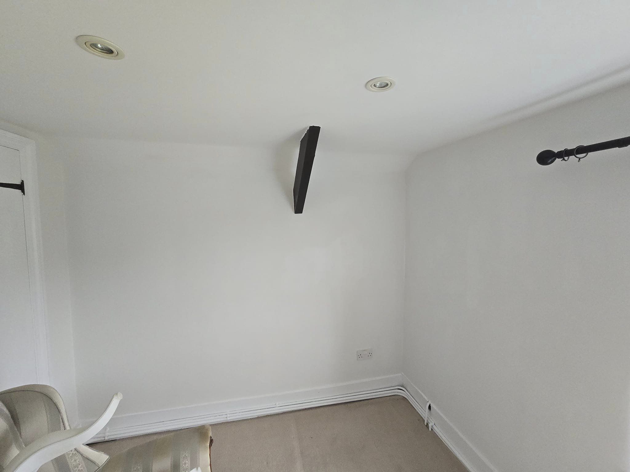 white room with black accents