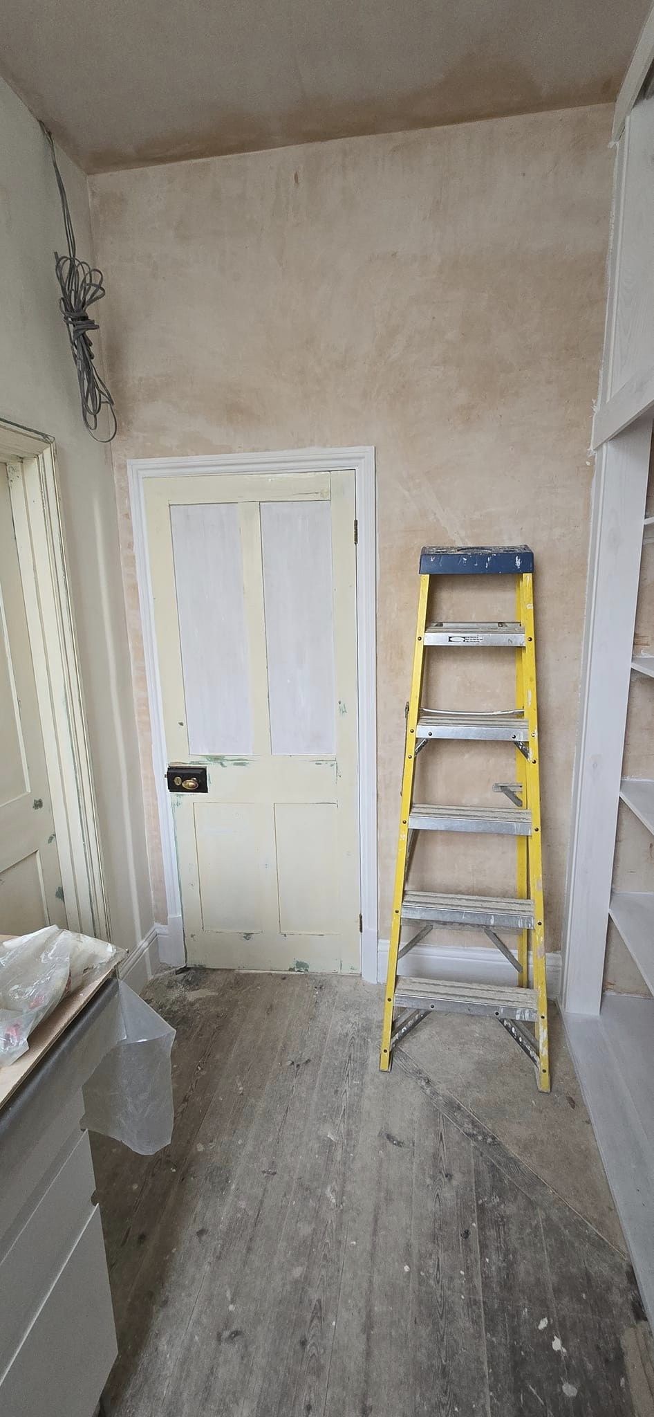 wall and door prepped for paint